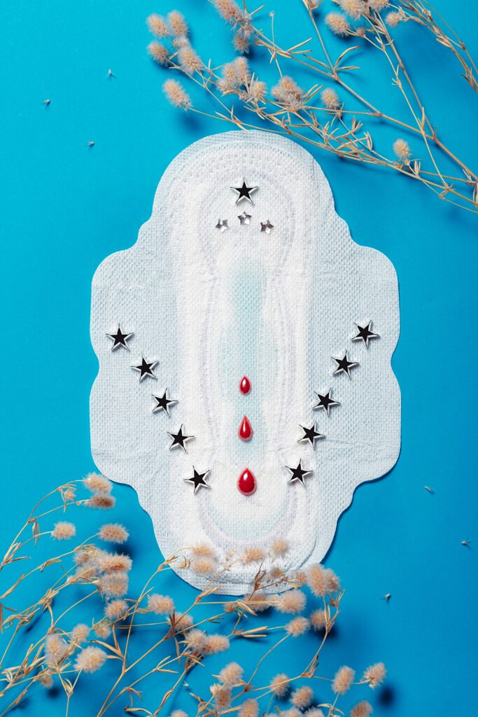 a menstrual pad against a blue background